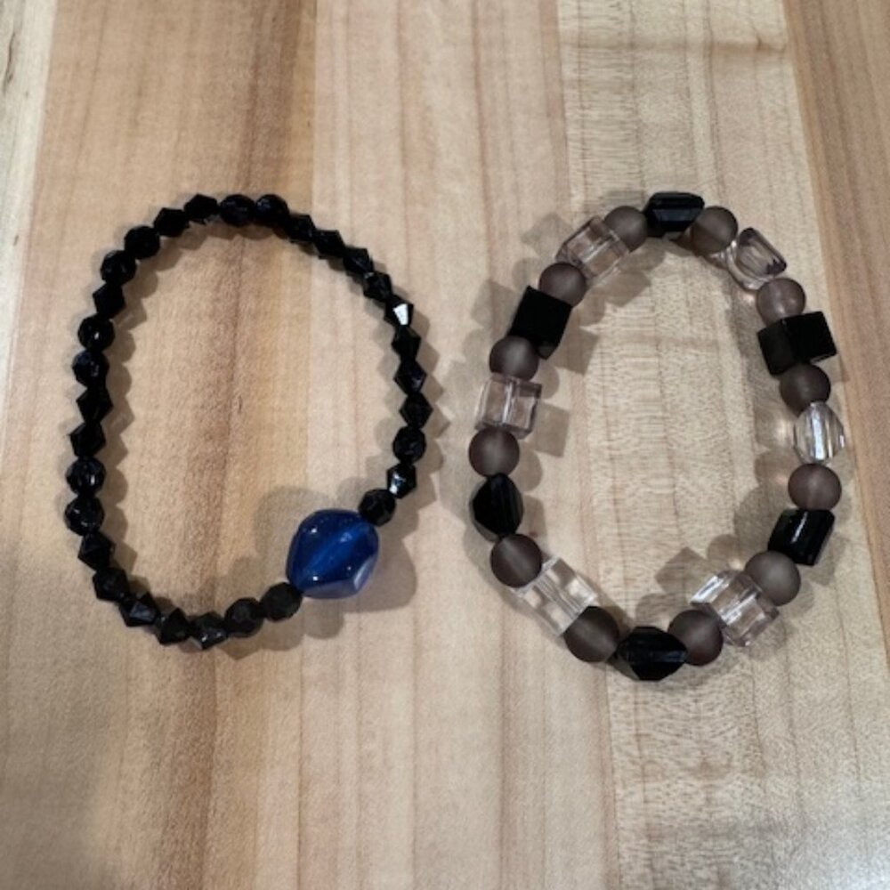 Matching set of two handmade black and tan beaded bracelets